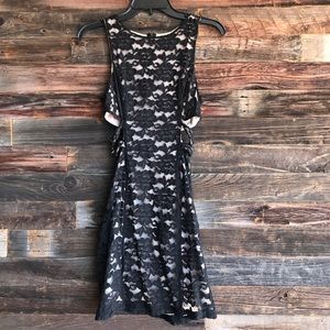 Black cocktail dress with lace detail